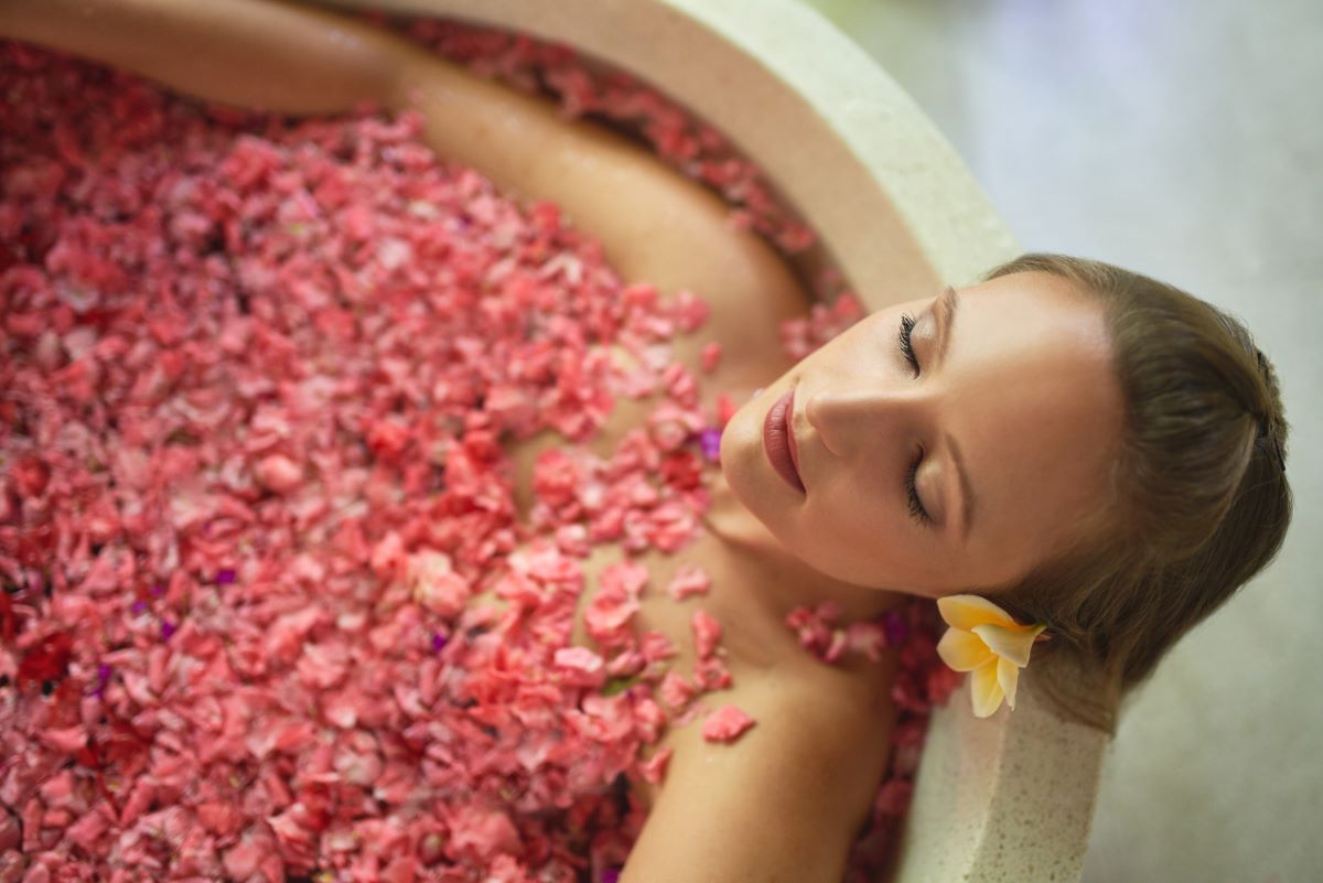 a woman soaking in the tub