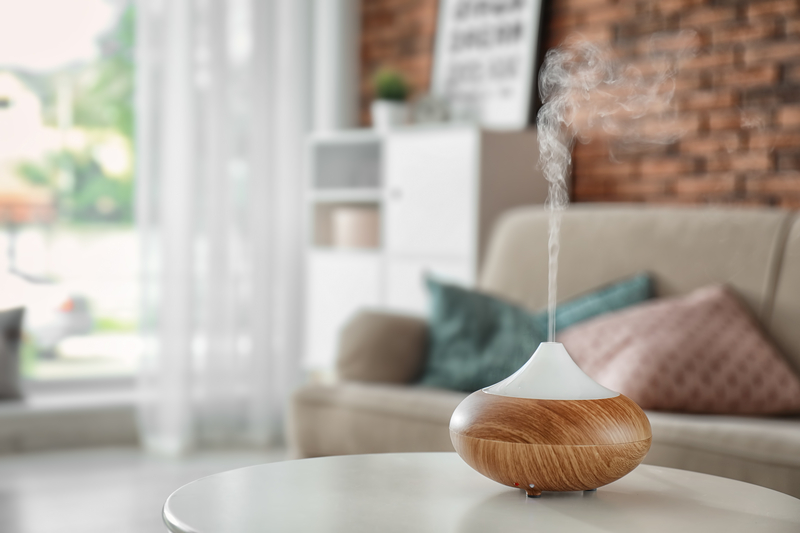 a scent diffuser sitting on a coffee table
